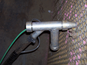 Air assist gun with a probe Air assist gun with a probe